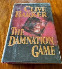 THE DAMNATION GAME BY CLIVE BARKER SIGNED 1991 HC/DJ 1ST EDITION FIRST PRINTING